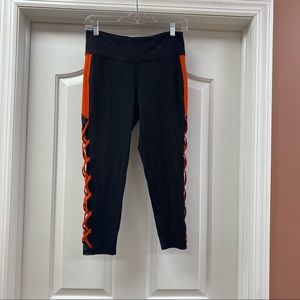 Capri color locked leggings w/ crisscross detail